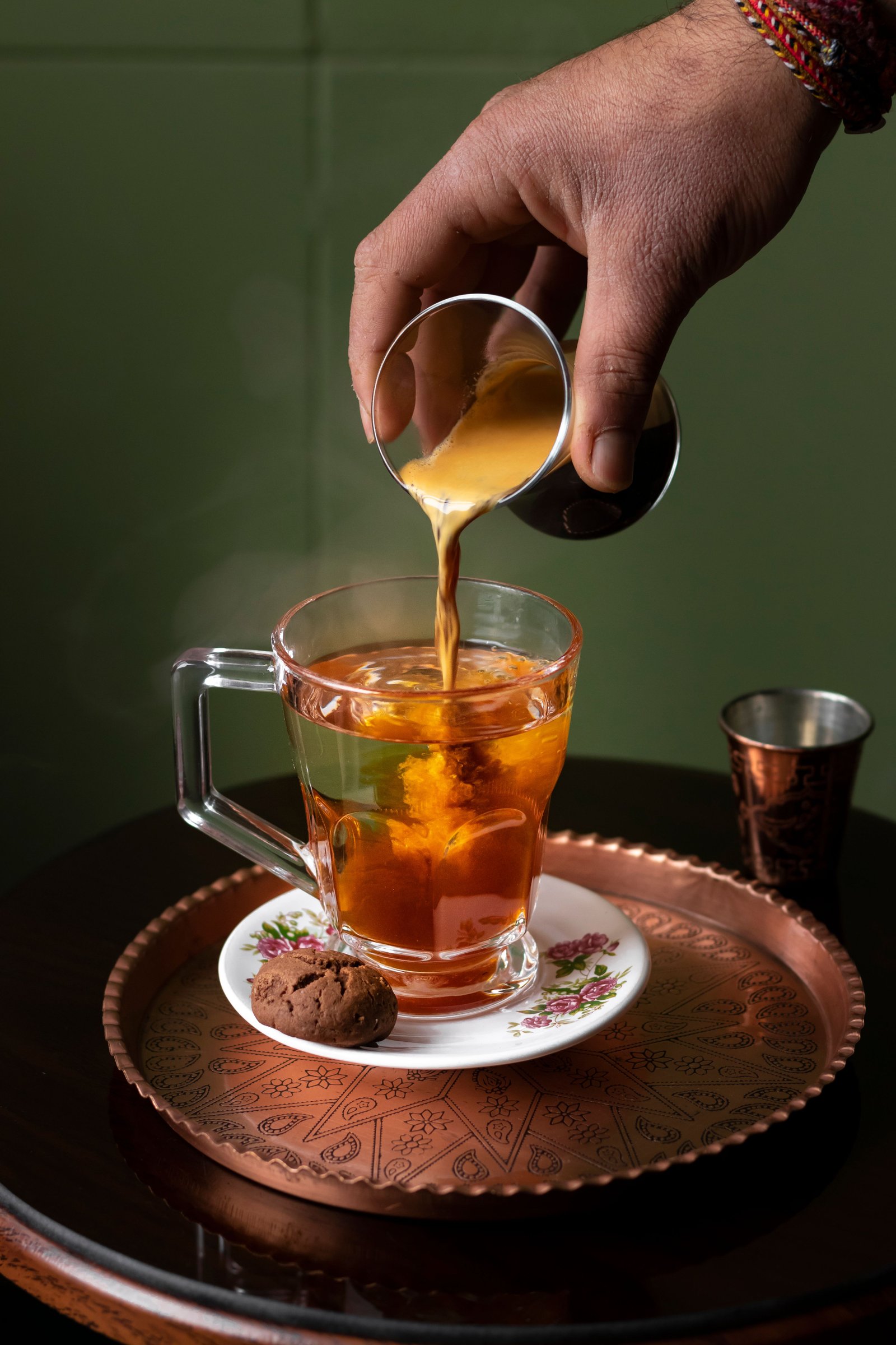 Hot chai being poured into a kulhad